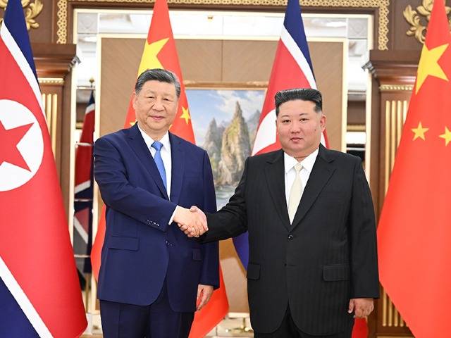 习近平同金正恩举行会谈