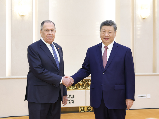 习近平会见俄罗斯外长拉夫罗夫